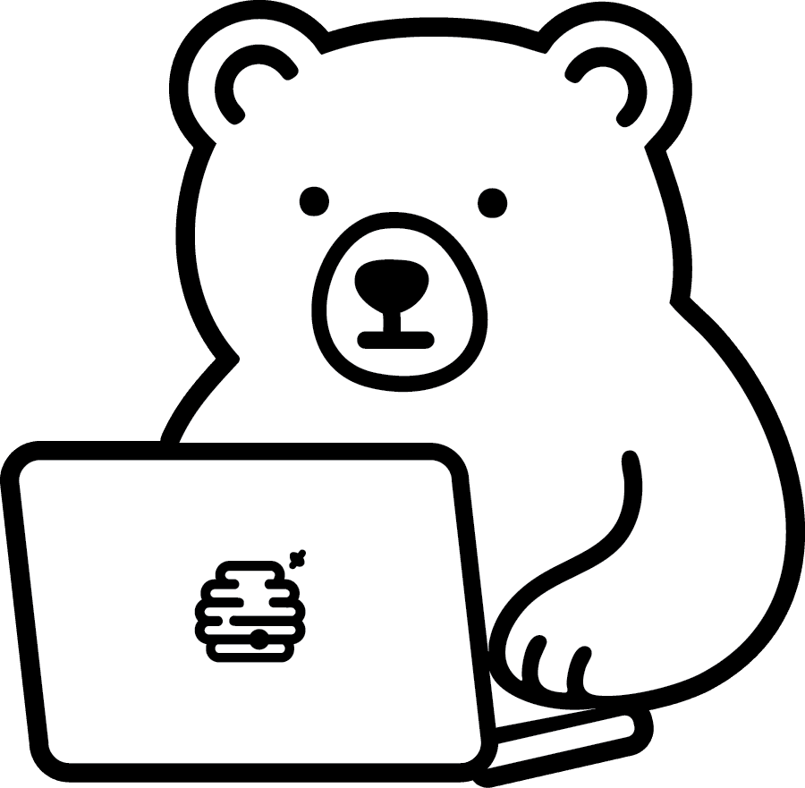 Mossy the bear, on a laptop.
